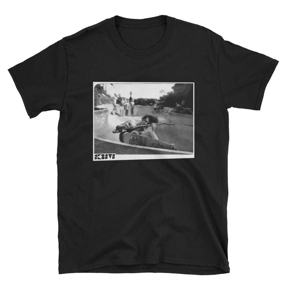 black skateboard tee shirt with a pool skater grinding while playing rock guitar acdc angus young streetwear custom diy